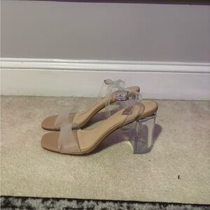 Clear heels  ( will be cleaned prior to shipping )